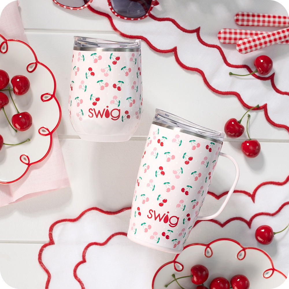Swig Life 12oz Wine Cup and 18oz Travel Mug in Cherry Pie shot on a tabletop with red cherries