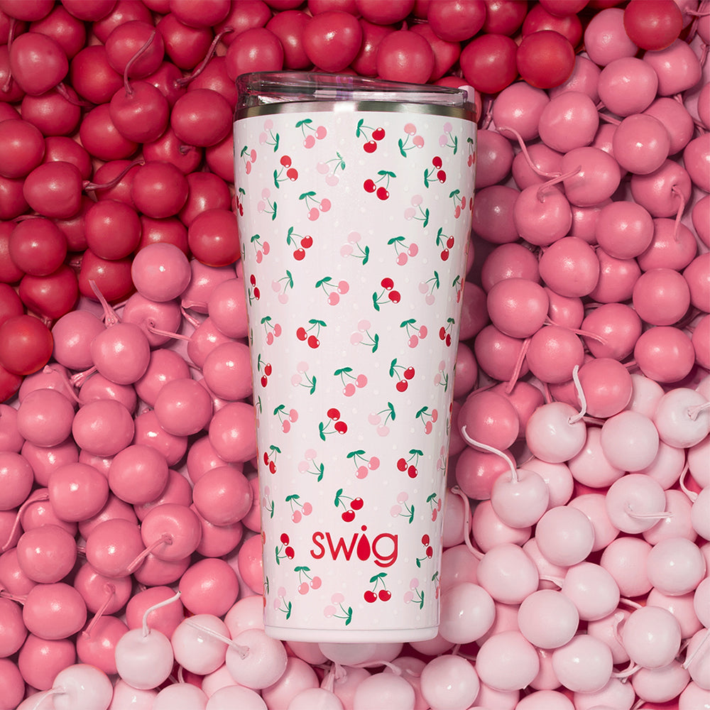 Swig Life Cherry Pie 32oz Tumbler shot on a background of cherries