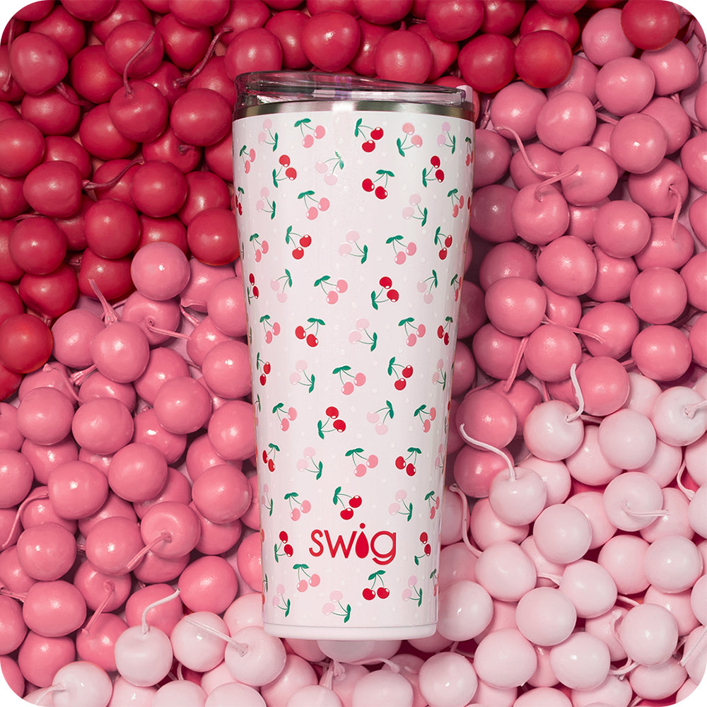 Swig Life Cherry Pie 32oz Tumbler shot on a background of cherries