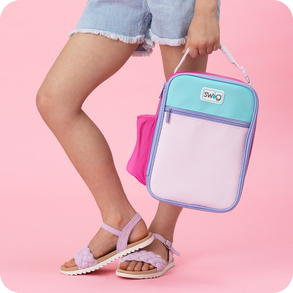 Swig Life Cotton Candy Boxxi Lunch Bag Lunch box colorblock over a pink background
