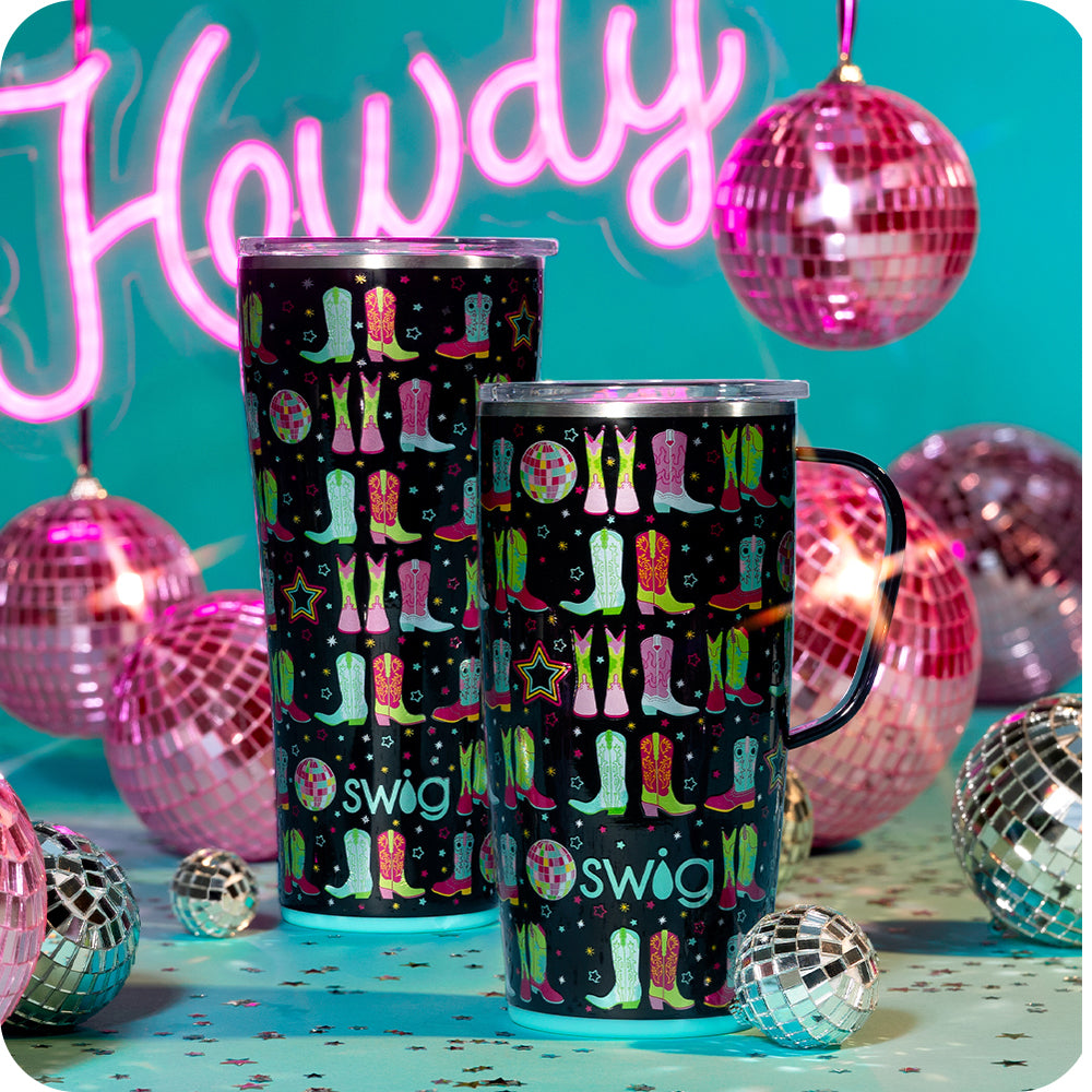 Swig Life Insulated Disco Cowgirl 32oz Tumbler and 22oz Travel Mug on a blue background with "Howdy" neon sign