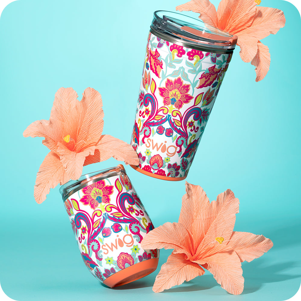Swig Life Flourish 24z Party Cup, 12oz Wine Cup shot with orange flowers on a blue background