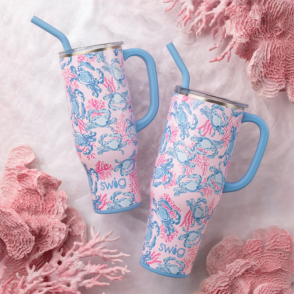 Swig Life Insulated Get Crackin' 40oz Mega Mug and 30oz Mega Mug on a pink coral background