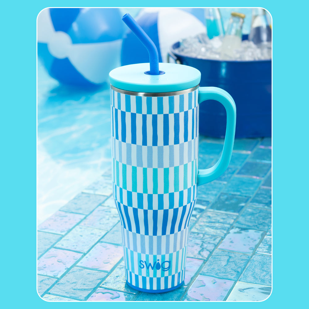 Swig Life Gracier Stripe 40oz Mega Mug shot poolside with beach balls
