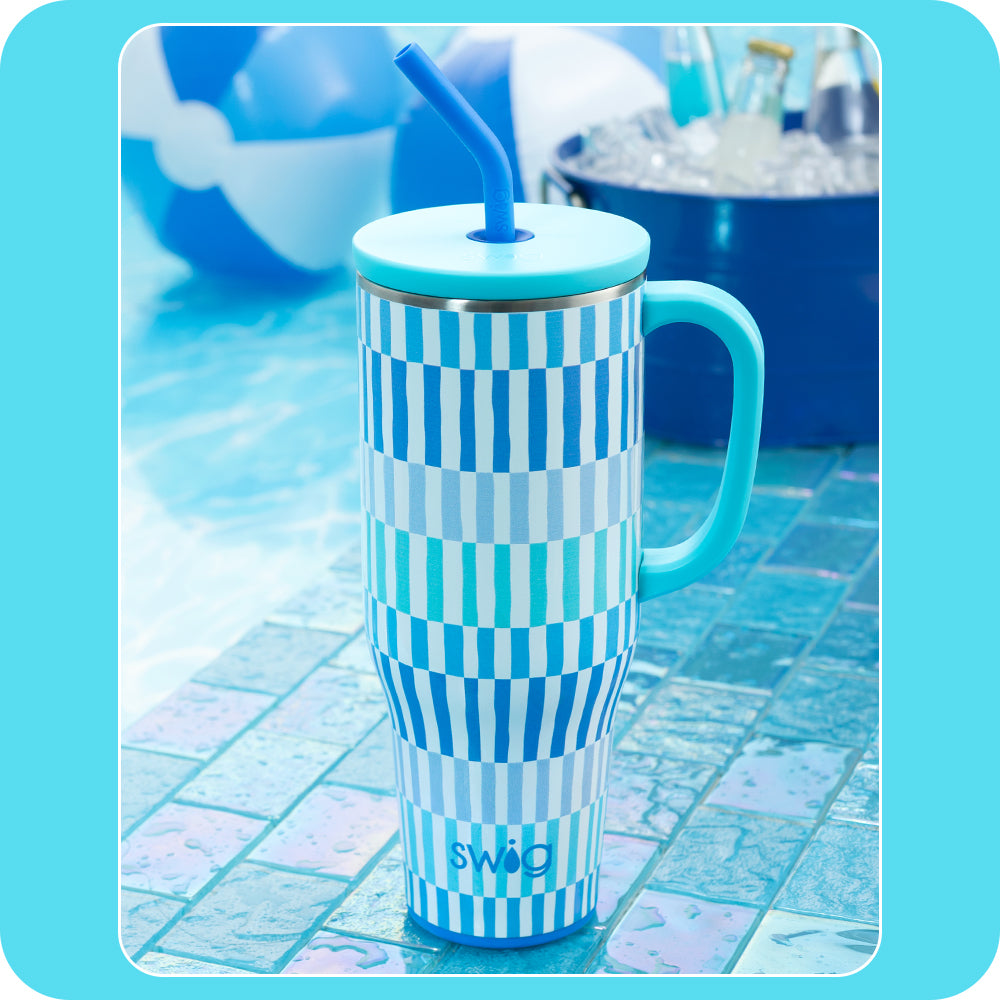 Swig Life Gracier Stripe 40oz Mega Mug shot poolside with beach balls