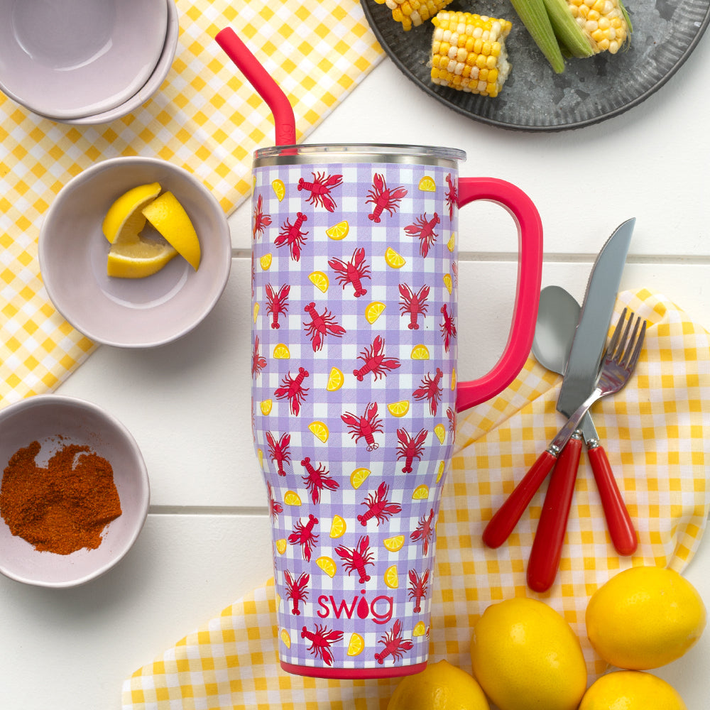 Swig Life Let the Good Times Boil 40oz Mega Mug featuring red crawfish and lemon slices on a light purple gingham background.