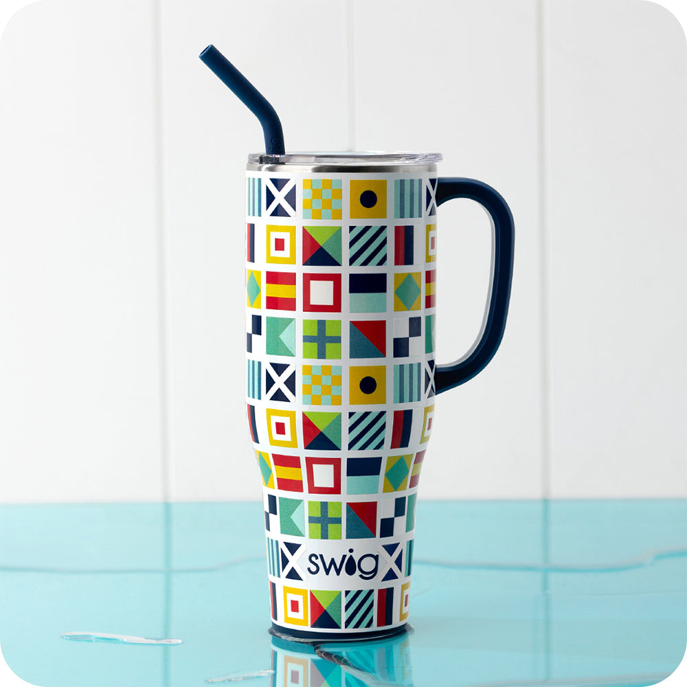 Swig Life Insulated 40oz Nauti Girl Mega Mug on a blue water background