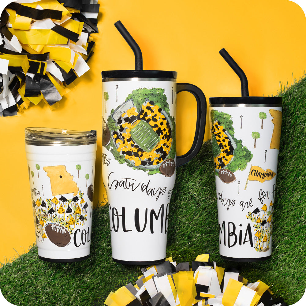 Swig Life Insulated Saturdays in Columbia, MO Drinkware collection on a sports field background
