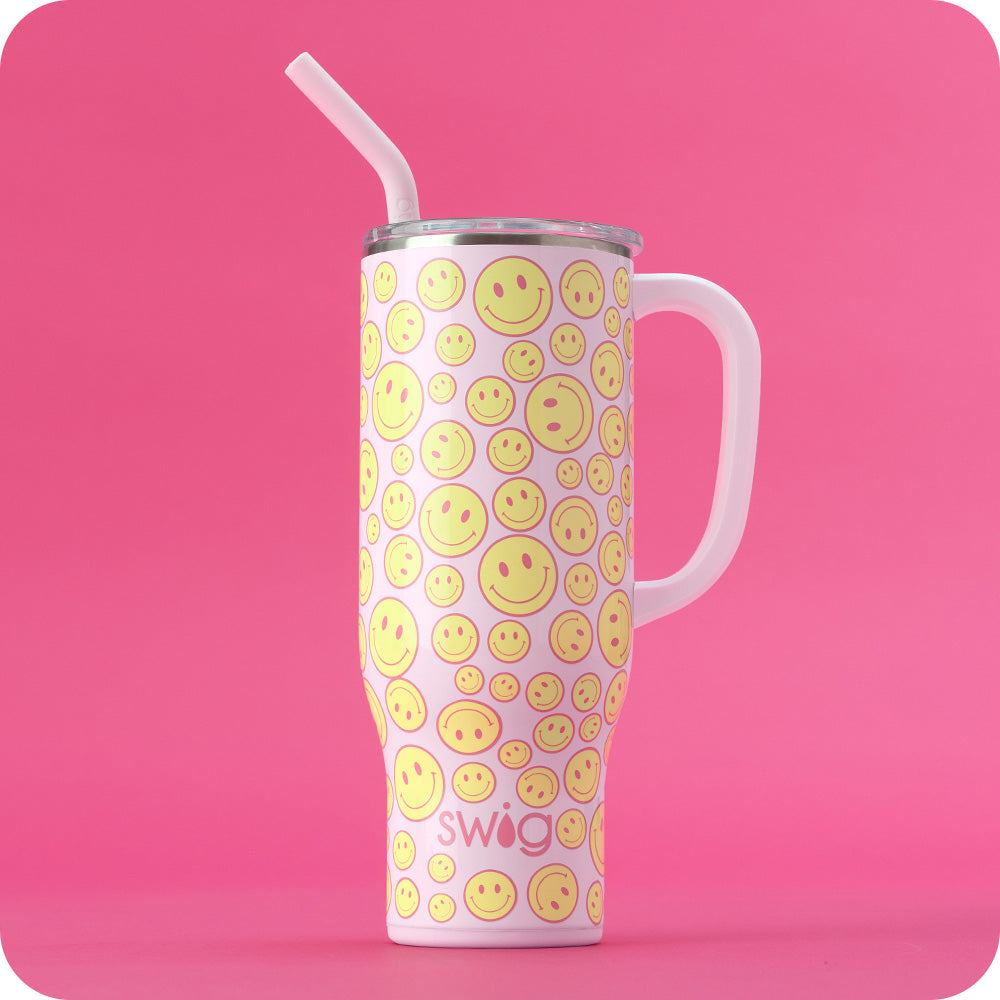 Swig Life 30oz Oh Happy Day Insulated Mega Mug with lid and straw on a hot pink background