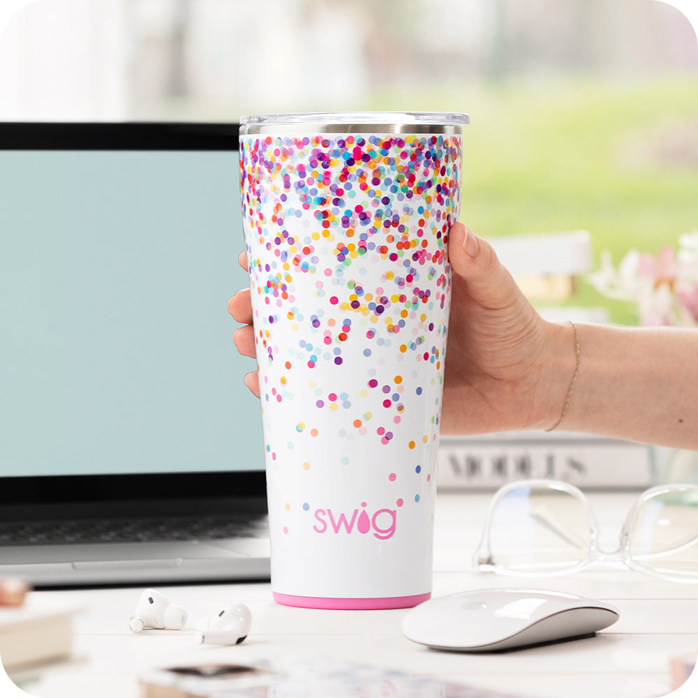 Swig Life 32oz Confetti Insulated Tumbler on a desk