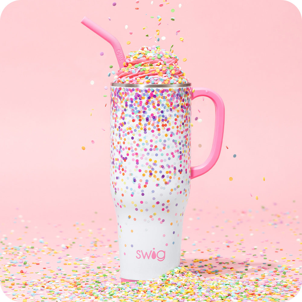 Swig Life 40oz Confetti Insulated Mega Mug with icing and sprinkles on a pink background