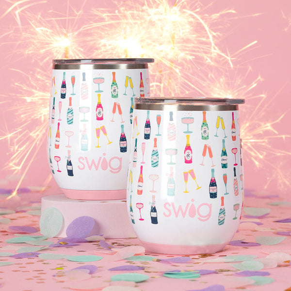 Swig Life Insulated 12oz Stemless Wine Cups with sparklers on a pink background