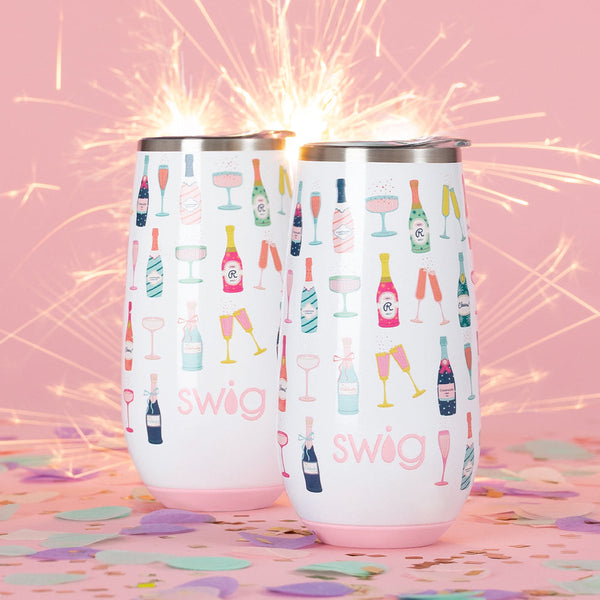 Swig Life Insulated 6oz Pop Fizz Champagne Flutes with sparklers and a pink background