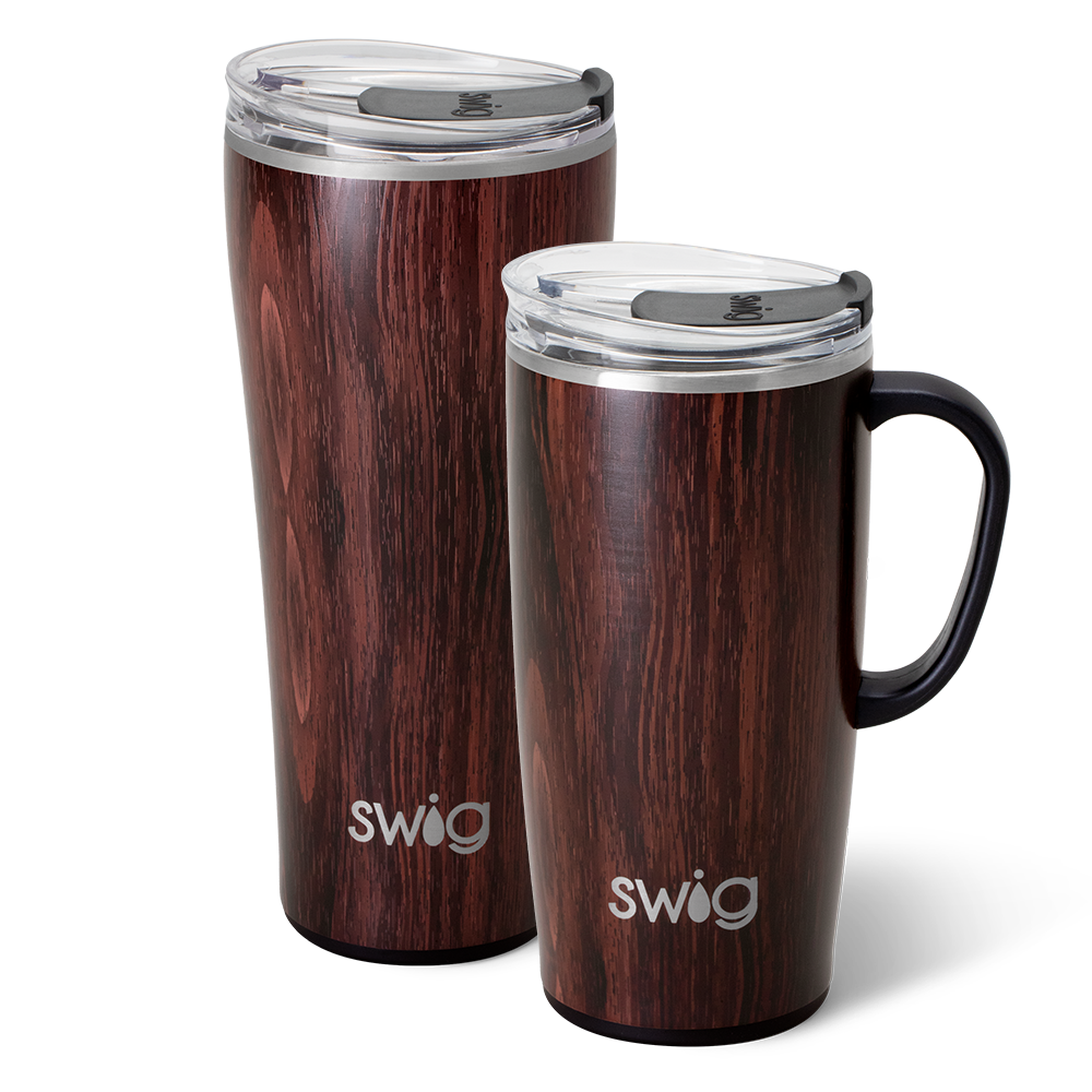Swig Life Bourbon Barrel XL Set including a 22oz Travel Mug and a 32oz Tumbler in front of a red paper fan