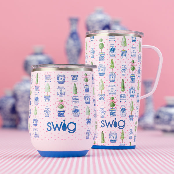 Swig Life Insulated 22oz Travel Mug and 12oz Stemless Wine Cup in Ginger Jars on a pink background
