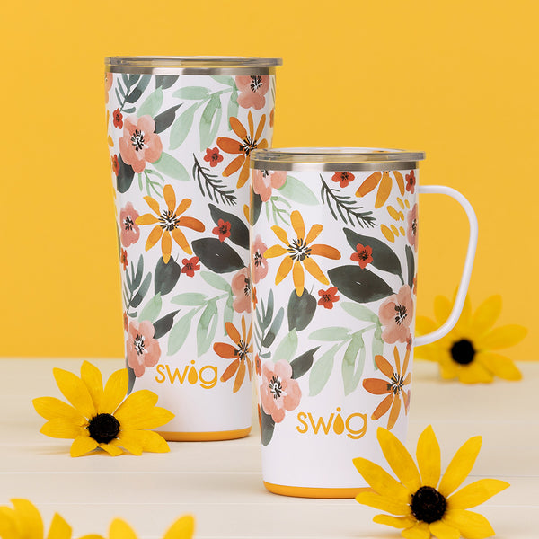 Swig Life Insulated 22oz Travel Mug and 32oz Tumbler in Honey Meadow on a yellow background with flowers