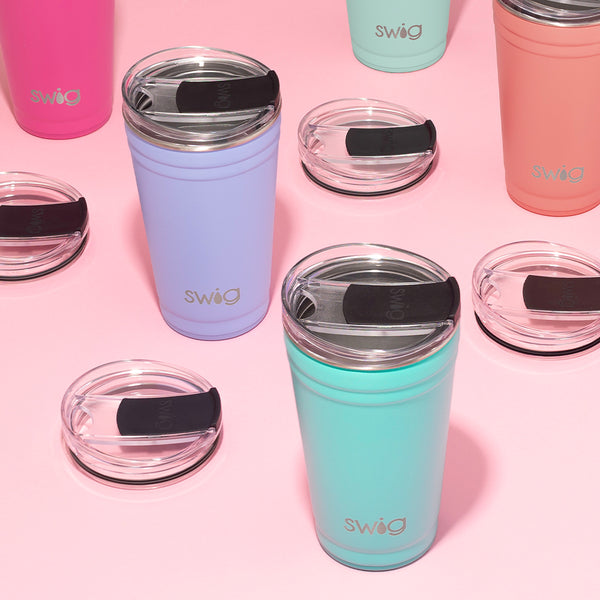 Swig Life 24oz Insulated Party Cup Tumblers group shot on a pink background