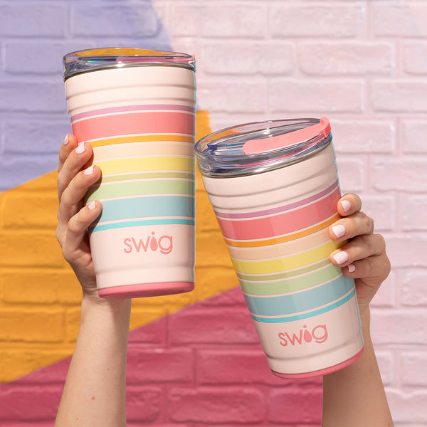 Two Swig Life 24oz Good Vibrations Insulated Party Cups on a colorful background