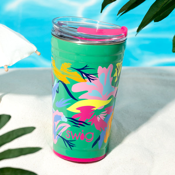 Swig Life 24oz Paradise Insulated Stainless Steel Party Cup on a sandy beach setting