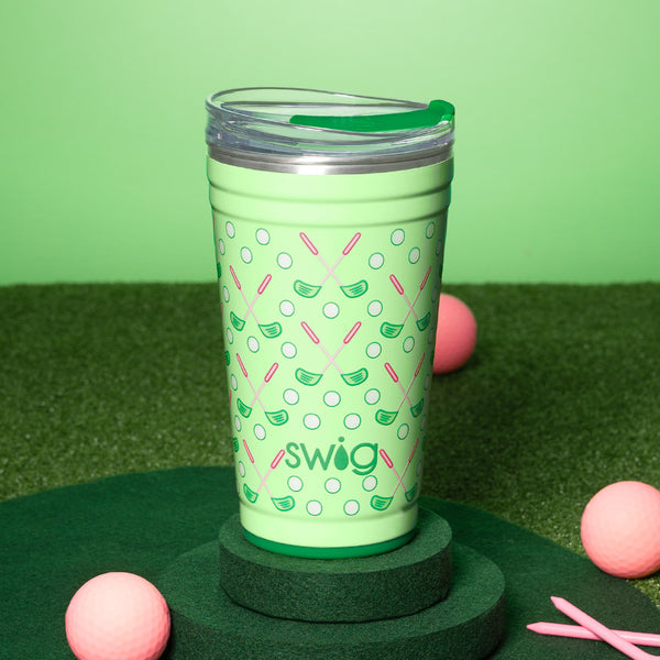 Swig Life 24oz Tee Time Insulated Party Cup on a green grassy background