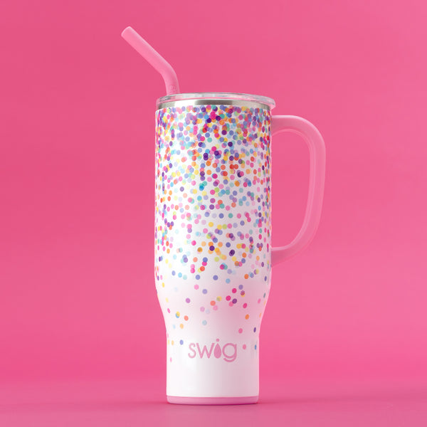Swig Life 30oz Confetti Mega Mug with lid and straw on a hot pink background