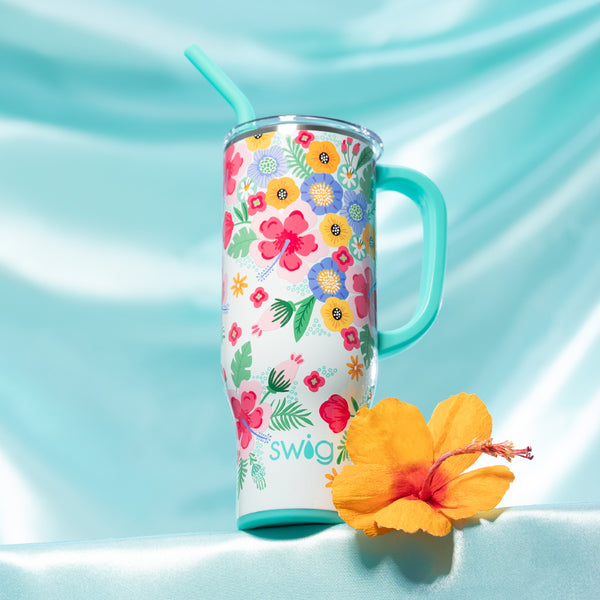 Swig Life 30oz Insulated Island Bloom Mega Mug with a tropical flower on a blue background
