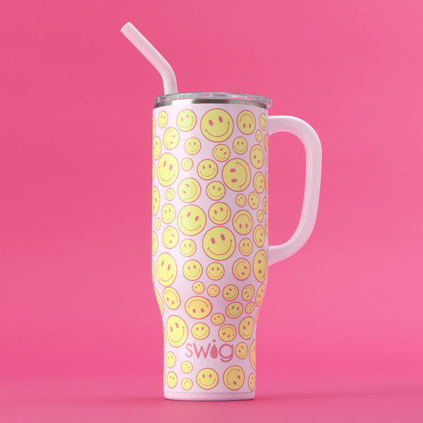 Swig Life 30oz Oh Happy Day Insulated Mega Mug with lid and straw on a hot pink background