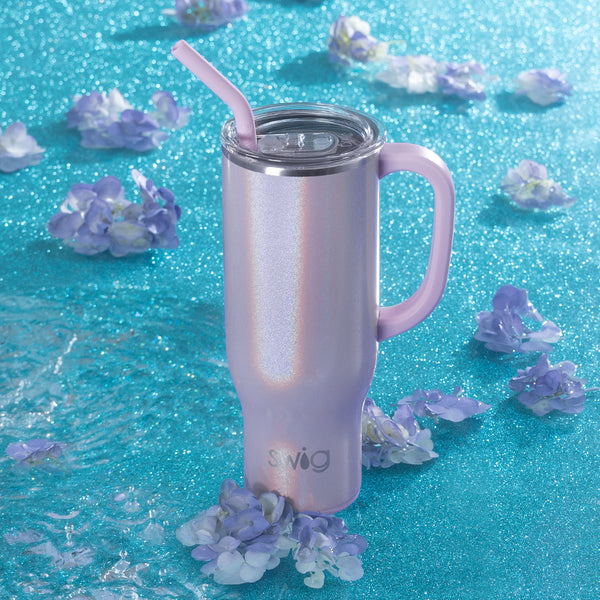 Swig Life 30oz Pixie Insulated Mega Mug on a blue glitter background