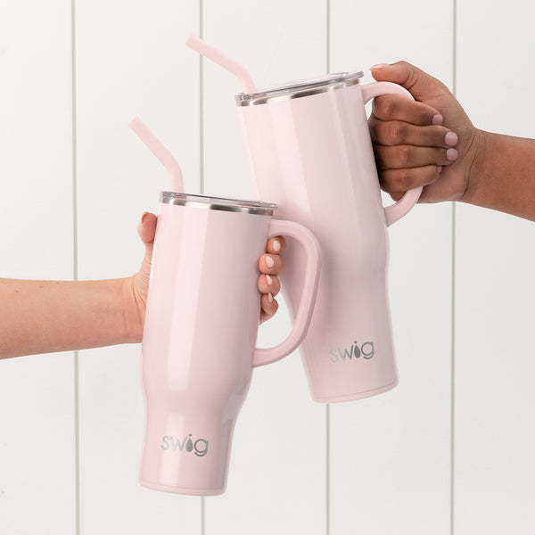 Swig Life 40oz and 30oz Shimmer Ballet Insulated Mega Mugs being held by the handle over a white background