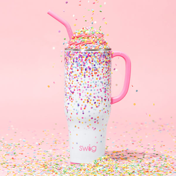 Swig Life 40oz Confetti Insulated Mega Mug with icing and sprinkles on a pink background