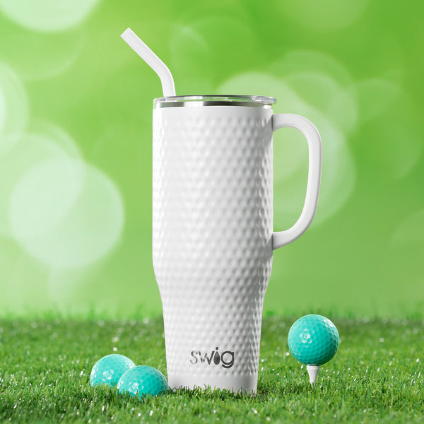 Swig Life 40oz Golf Partee Mega Mug on a green grassy background next to golf balls
