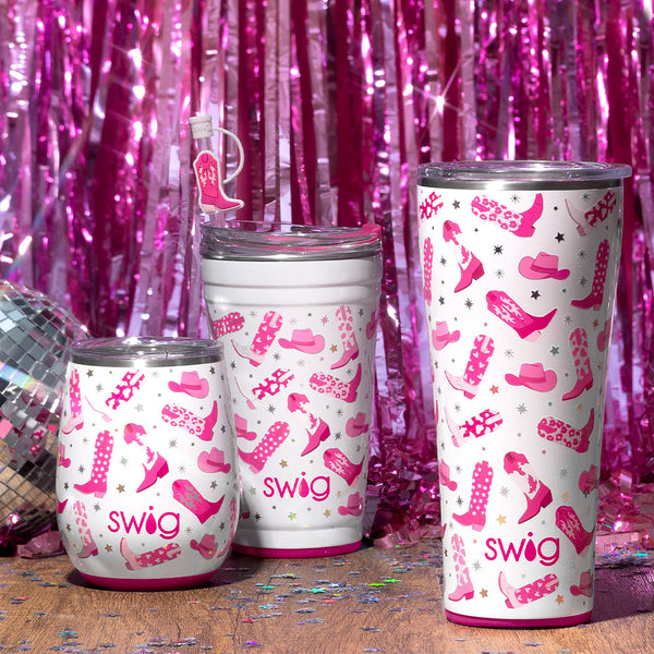 Swig Life Let's Go Girls 14oz Stemless Wine Cup, 24oz Party Cup, and 32oz Tumbler on a pink shimmer background