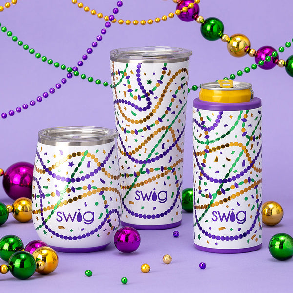 Swig Life Hey Mister Skinny Can Cooler, 32oz Tumbler, and 14oz Wine Cup surrounded by beads on a purple background