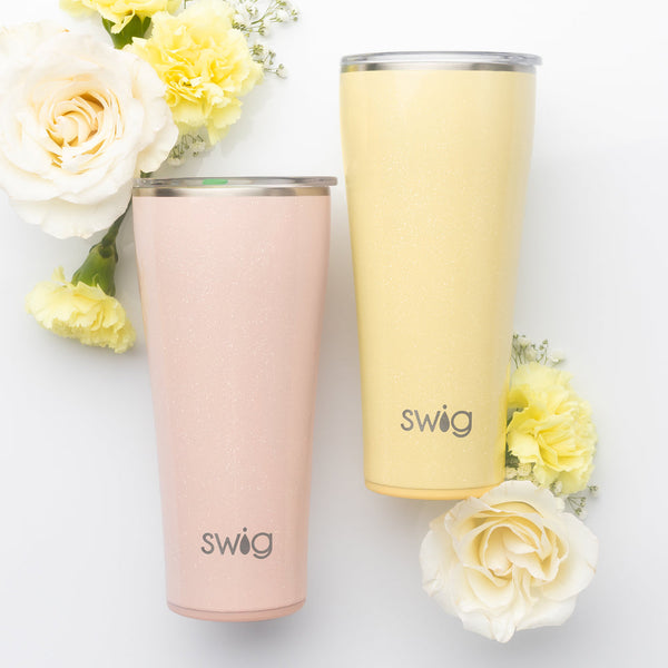 Swig Life Shimmer Ballet and Shimmer Buttercup 32oz Tumblers surrounded by soft yellow roses