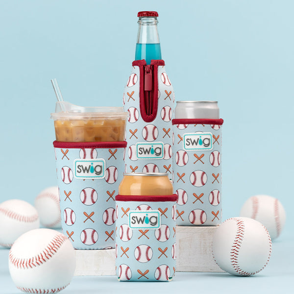 Swig Life Home Run Neoprene Coolies surrounded by baseballs on a blue background