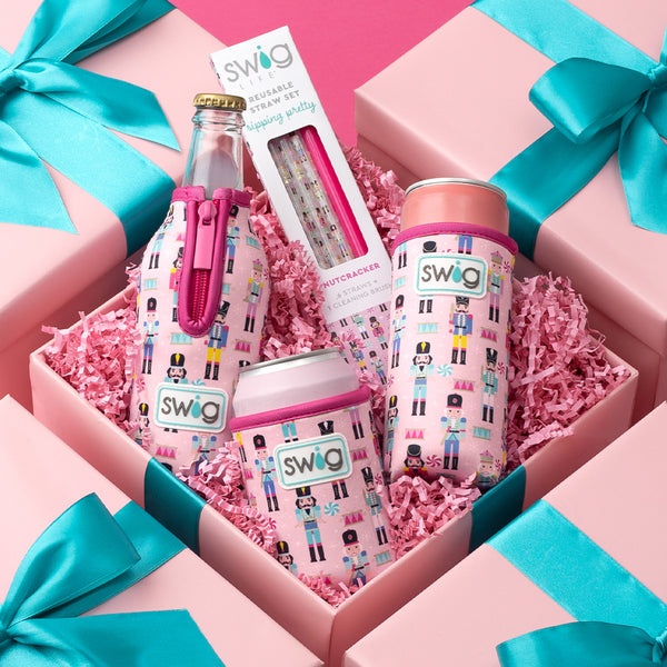 Swig Life Nutcracker Can Coolie gift wrapped with Nutcracker Bottle Coolie, Slim Can Coolie, and Nutcracker reusable straws