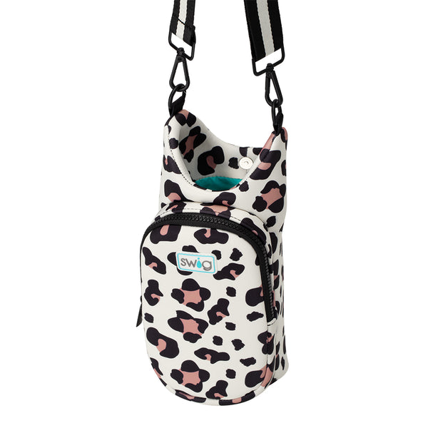 Swig Life Luxy Leopard Insulated Neoprene Water Bottle Bag with over the shoulder strap showing button closure from the top