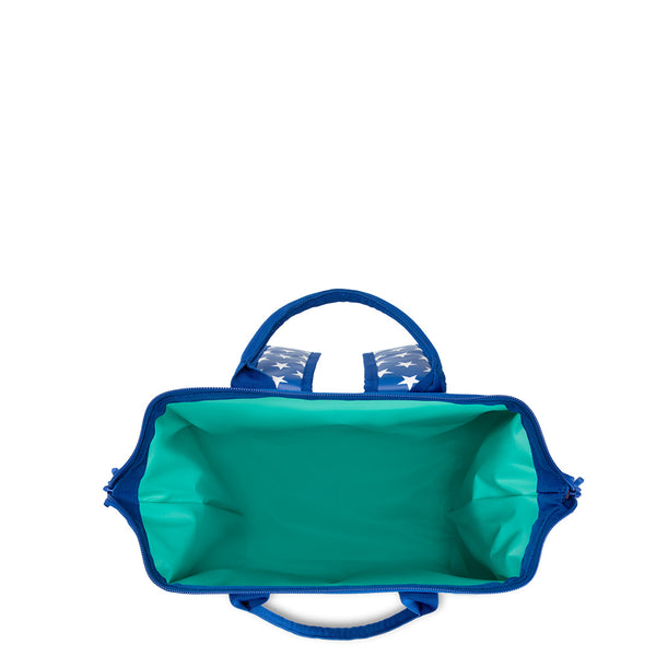 Swig Life All American Packi Backpack Cooler shown open from the top with aqua insulated liner