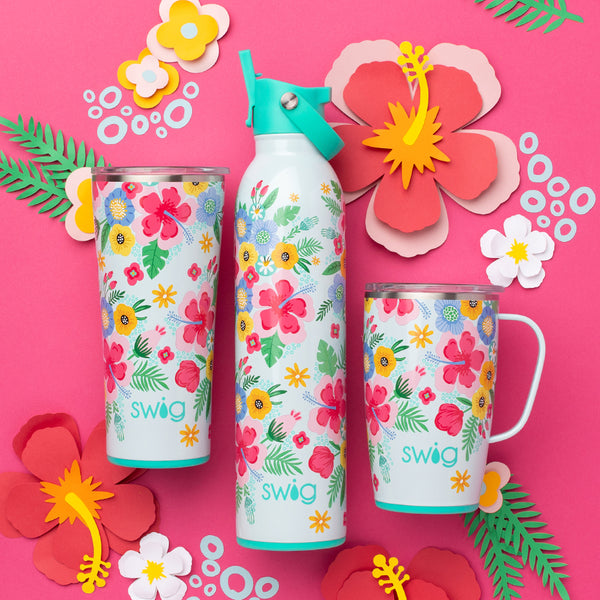 Swig Life Island Bloom 22oz Tumbler, 26oz Water Bottle, 18oz Travel Mug on pink background with tropical flowers