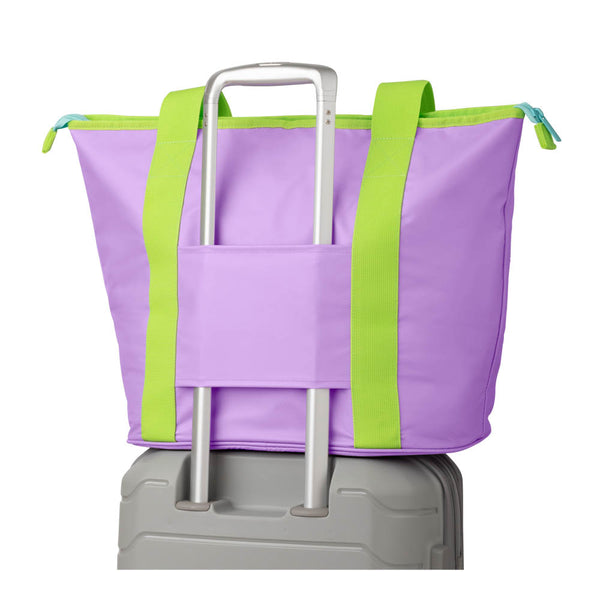 Swig Life Ultra Violet Zippi Tote Bag back view on luggage trolley