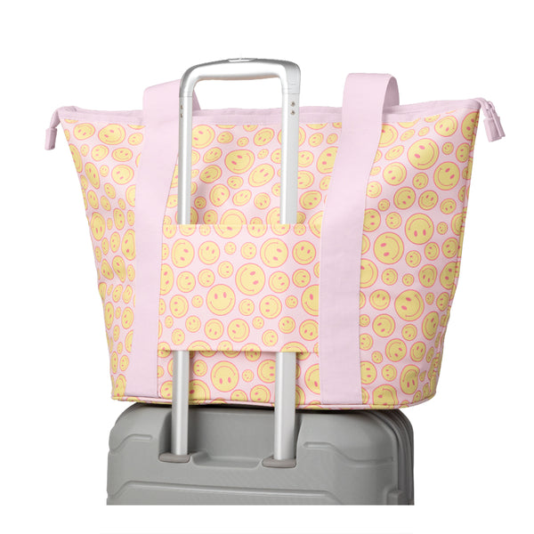 Swig Life Oh Happy Day Zippi Tote Bag back view on luggage trolley