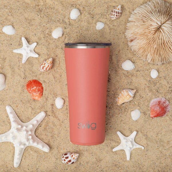 https://www.swiglife.com/cdn/shop/products/swig-life-signature-22oz-tumbler-matte-coral-lifestyle_grande.jpg?v=1696347640