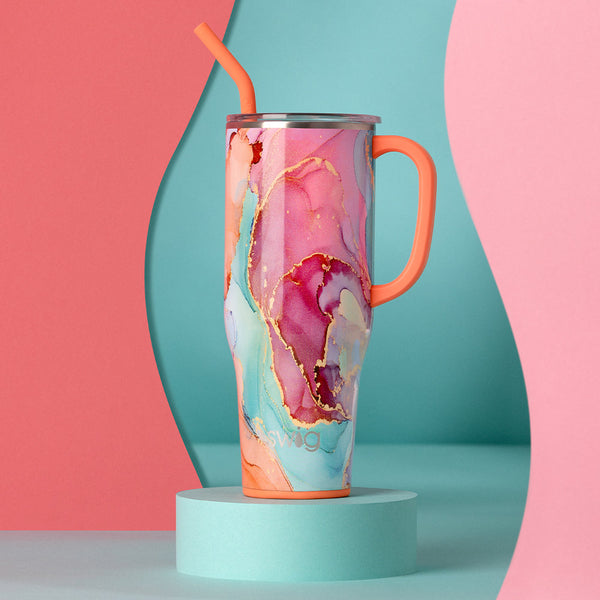 Swig Life 40oz Dreamsicle Mega Mug on a teal and pink abstract background